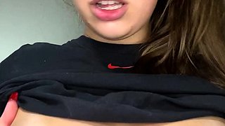 Busty curly brunette with big boobs fucks on couch