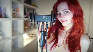 Redheaded pierced teen close up toy show