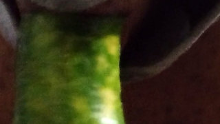 Busty bitch playing with herself and fucking herself with a cucumber