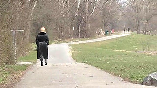 Bitch in leather pissing on a pier