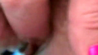 Curly-haired Babe Masturbates with Bottle in Hot Tub