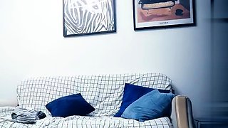 Cute amateur asian web cam girl playing with her toy