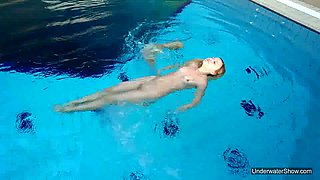 Too pale chick is all naked and she swims so damn sexy