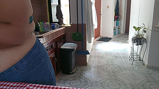 Mom in the kitchen in bralett