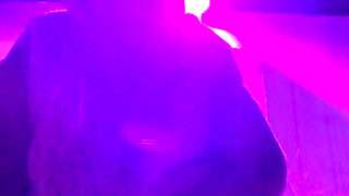 Smoking a Cigarette Outdoor While Wearing Only a Bikini and a Jacket