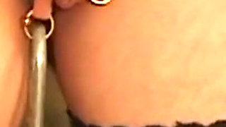 Chained Mature Brunette MILF Endures Nipple Weights and Spanking