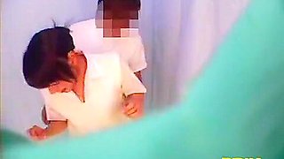 Japanese college chicks flashing tits in a photobooth