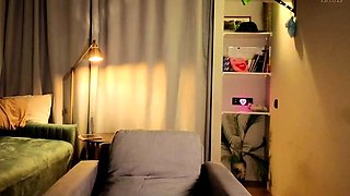 Masturbating blonde teen on couch with big toys