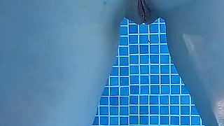Nude Pool Tease and Masturbation While He Watches