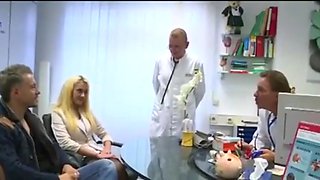 Husband waits while wife is examined