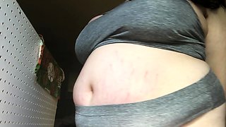 Busty curly brunette with big boobs fucks on couch