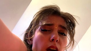 Amateur young brunette enjoys dildo on solo masturbation