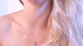 She Strokes Her Pink Pussy