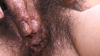 German Babe Plays with Her Hairy Pussy in Close up
