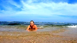 Blonde Babe's Naked Swim in the Ocean