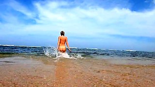 Blonde Babe's Naked Swim in the Ocean