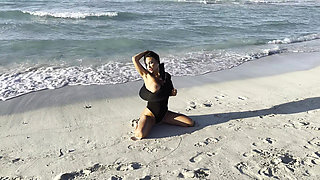 Sexy Monika Fox in Black Bodysuit on Beach