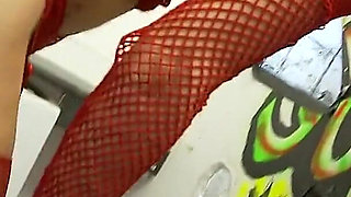 Dirty brunette in fishnets gets banged by a dick through a glory hole after sucking it