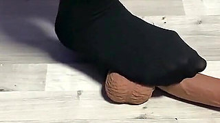 Sexy Dominatrix in Nylon Pantyhose Is Trampling Your Cock