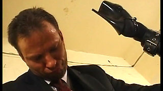 Tied up woman with clitoris piercings, sodomized by a stick