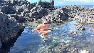 Nudist Girl Swimming Naked in the Natural Pool Outdoor