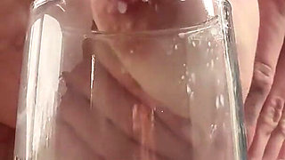 Petite MILF Milks Huge Titties Into Cup