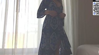 Blonde woman loves a solo hotel remain on bed