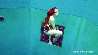 Damn steamy underwater solo show performed by aroused and lovely chick