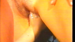 Two sexy brunette lesbians licking each others pussies