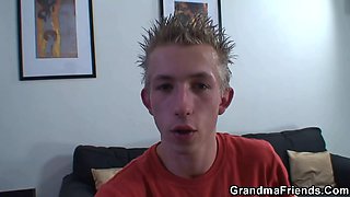 Two studs share a hairy, mature granny in a steamy threesome with big tit MILFs