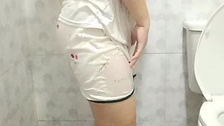 Plump girl takes a shower