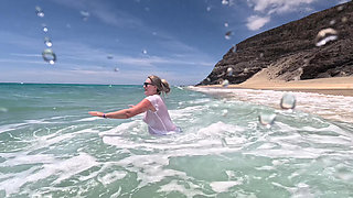 Girl Wetting Jeans in the Ocean and Swimming in Wet White T-shirt