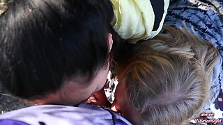 Outdoor double blowjob in a car trunk