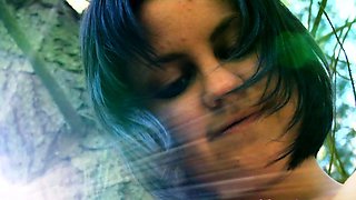 Amateur model in public nudity and outdoor dildo