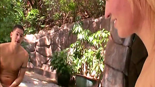 He Is Lying by the Pool When She Sits on His Cock